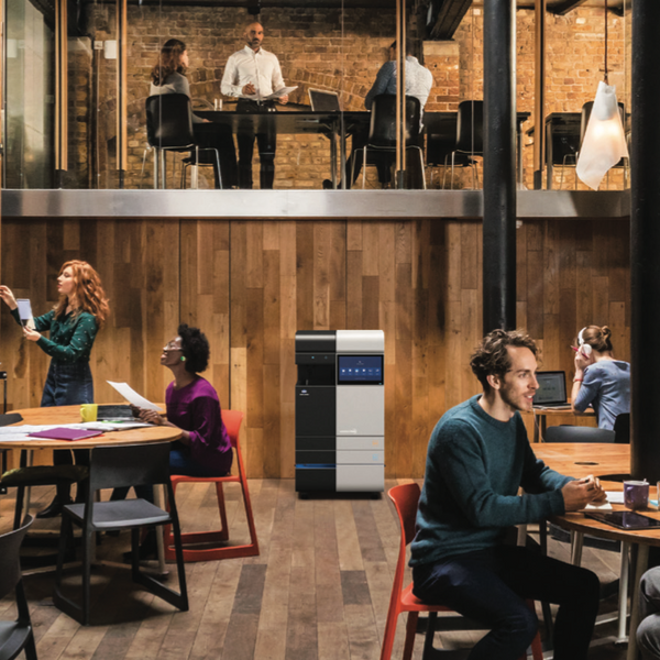 Various groups of people working at the office