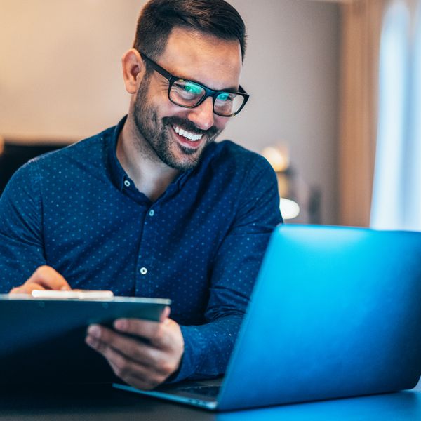 Man working at home using lap top