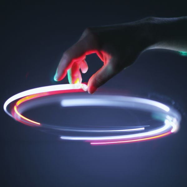 Hand controling light circle in air